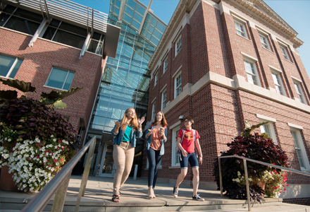 Students walking outside of buildings